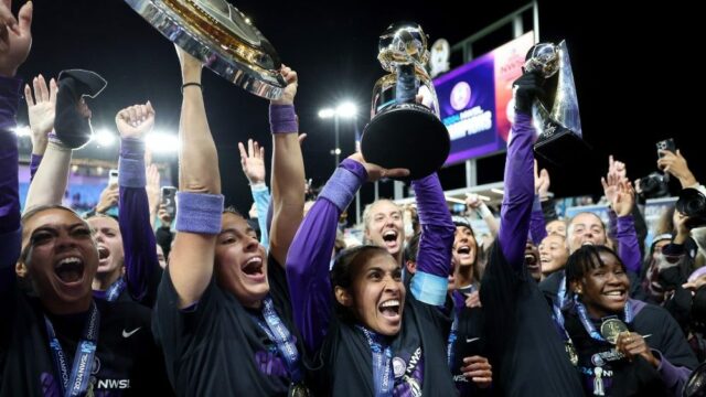 KANSAS CITY, MISSOURI - NOVEMBER 23:  Orlando Pride players celebrate after defeating the Washington Spirit 1-0 in the NWSL 2024 Championship Game at CPKC Stadium on November 23, 2024 in Kansas City, Missouri. (Photo by Jamie Squire/Getty Images)