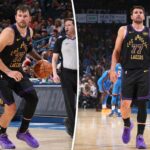 Luka Dončić, vestindo uma camisa preta do Lakers com