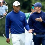 Rory McIlroy da Irlanda do Norte e Tiger Woods dos Estados Unidos caminham juntos no buraco 11 durante uma rodada de treinos antes do Torneio Masters de 2023 no Augusta National Golf Club em 3 de abril de 2023 em Augusta, Geórgia.