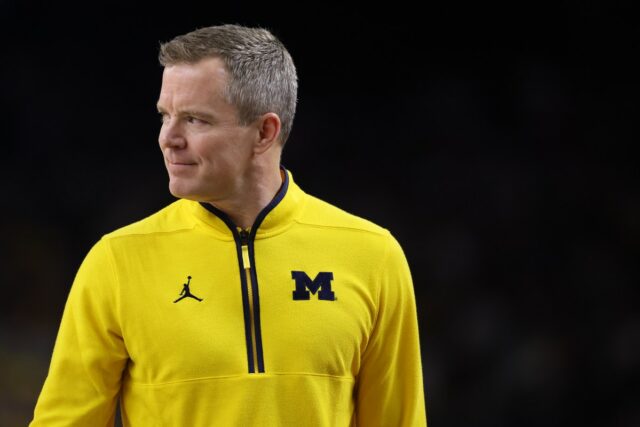 Head coach Dusty May of the Michigan Wolverines looks on during the first half of a game against the UConn Huskies in the National Championship of the 2026 NCAA Men's Basketball Tournament at Lucas Oil Stadium on April 06, 2026 in Indianapolis, Indiana.
