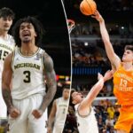 Elliot Cadeau (3) de Michigan reage enquanto seu companheiro de equipe Aday Mara (15) assiste durante a primeira metade de um jogo de torneio de basquete universitário da NCAA.