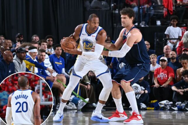 Na vitória dos Warriors, Al Horford fez 'uma das coisas Al Horford segura a bola durante o jogo contra o LA Clippers.