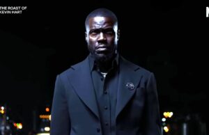Novidades na Netflix: lista completa de programas e filmes em maio de 2026 A man in a black suit standing in front of a dark backdrop