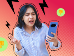 O Google mudou meu recurso mais querido e é um símbolo de como está piorando o Android Mascote Android com uma lupa ao lado de um smartphone Samsung.