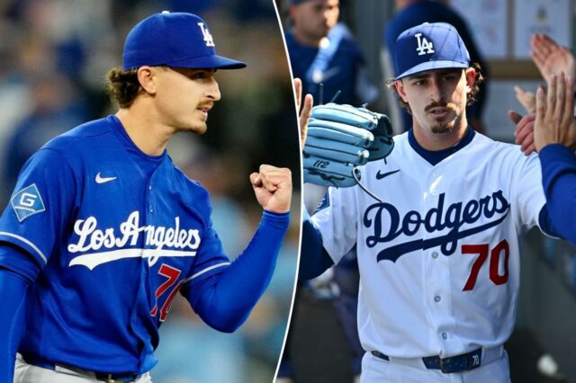Justin Wrobleski em um uniforme azul do Los Angeles Dodgers com o punho levantado.