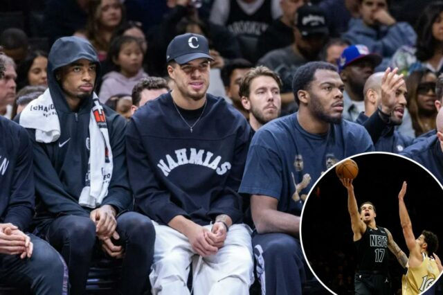 O enigma de Michael Porter Jr. que os Nets enfrentam O pivô do Nets, Nic Claxton (esquerda), Michael Porter Jr. (c.) e Day'ron Sharpe assistem durante o segundo tempo contra o Atlanta Hawks no Barclays Center, sexta-feira, 3 de abril de 2026, no Brooklyn, NY.