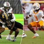 Brandon Cisse nº 15 do South Carolina Gamecocks enfrenta Marquis Johnson nº 2 do Missouri Tigers