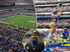 O safety dos Rams, Quentin Lake, teve uma reação chocante aos torcedores do 49ers que assumiram o SoFi Stadium Um grande estádio de futebol com um jogo em andamento, lotado de espectadores.