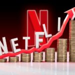 Logotipo Tubi amarelo em um fundo roxo com pôsteres de filmes desfocados.