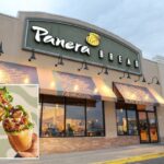 Exterior de um restaurante Panera Bread com placa e toldos, próximo a uma loja Carter's.