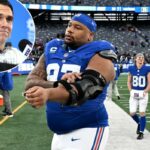 O tackle defensivo do New York Giants, Dexter Lawrence II (97), sai do campo depois que os Giants derrotaram o Dallas Cowboys por 34-17 em East Rutherford, NJ.