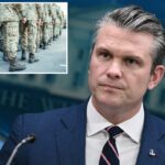 Exército de botas militares caminha pela colheita do campo de desfile photo