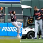 O defensor central do Tigers, Parker Meadows, é ajudado a sair do campo após uma colisão com o defensor esquerdo Riley Greene durante a oitava entrada do jogo de beisebol contra o Minnesota Twins, quinta-feira, 9 de abril de 2026, em Minneapolis.