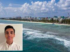 Perna do recém-casado amputada após ataque de tubarão nas Maldivas enquanto a noiva assistia horrorizada Um jovem de cabelos escuros vestindo uma camisa branca.