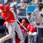 O defensor direito do New York Yankees, Aaron Judge, contorna as bases depois de fazer um home run solo.