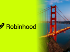 Robinhood enfrenta novo processo federal sobre contratos esportivos enquadrados como esquema de investimento Logotipo da Robinhood ao lado da Golden Gate Bridge em São Francisco, representando o processo federal da Robinhood sobre contratos de previsão esportiva e mercados de apostas