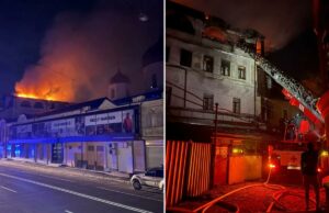 Rússia desencadeia onda implacável de ataques de drones na Ucrânia, diz Kiev Um prédio em chamas com veículos de emergência na rua à noite em Kharkiv, Ucrânia.