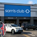 Uma placa do Sam's Club na frente de uma loja com pessoas e carros no estacionamento.