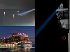 Trabalhador de navio de cruzeiro norueguês desaparecido após cair ao mar na costa de Massachusetts: ‘Muito comovente’ Um navio de cruzeiro à noite com um feixe de holofote brilhando na água escura e uma bóia salva-vidas pendurada na lateral do navio.