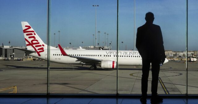 Virgin cortará voos e aumentará custos após queda de US$ Avião genérico da Virgin Austrália