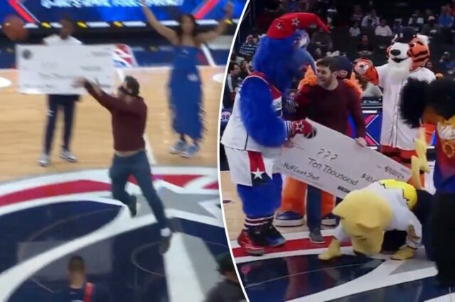 Um fã posando para uma foto com os mascotes do Washington Wizards e um cheque falso de US$ 10 mil por uma pegadinha do Dia da Mentira.
