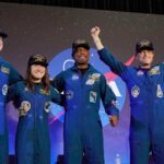 Os membros da tripulação do Artemis, Jeremy Hansen, Christina Koch, Victor Glover e Reid Wiseman aparecem em Houston.