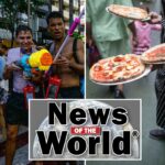 Foliões participando de lutas pela água durante o festival Songkran em Bangkok.