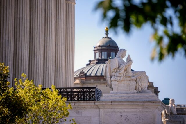 The marble statue Contemplation of Justice is seen outside the U.S. Supreme Court building on May 4, 2026, in Washington, D.C.