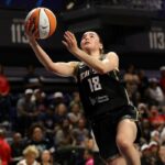 Pauline Astier nº 18 do New York Liberty vai até a cesta.