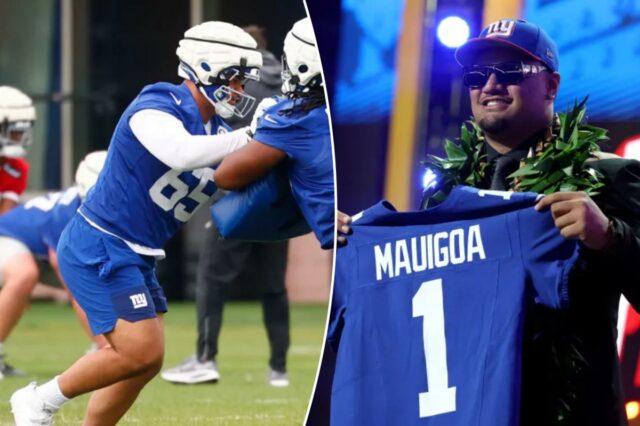 Os jogadores do New York Giants, Francis Mauigoa (65) e Derrick Graham (76) durante o treino de futebol.