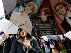 A turnê de retorno do BTS do K-pop reúne o esforço global de ‘soft power’ da Coreia do Sul FOTO DO ARQUIVO: O grupo Kpop BTS se apresenta durante o show 'BTS The Comeback Live Arirang' no centro de Seul, Coreia do Sul, 21 de março de 2026. REUTERS/Kim Hong-ji/Pool EDITORIAL SOMENTE PARA USO./Foto de arquivo