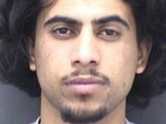 Adolescente é acusado de estuprar mulher em banheiro de praia Foto de custódia de Mohammed Abdullah, que tem cabelo preto espesso e cavanhaque e bigode