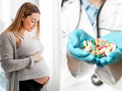 Altas doses de suplemento popular durante a gravidez podem melhorar o desempenho escolar das crianças Uma mulher grávida com blusa e cardigã cinza, tocando suavemente a barriga enquanto está perto de uma janela, sorrindo para a barriga.