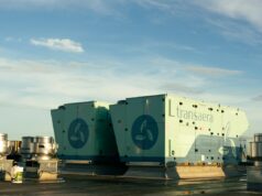 Amazon aposta que a desumidificação baseada no Prêmio Nobel pode reduzir seu uso de energia Two DOAS units stand on a rooftop.