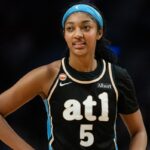 WNBA star Angel Reese reacts during the Atlanta Dream game against the Portland Fire