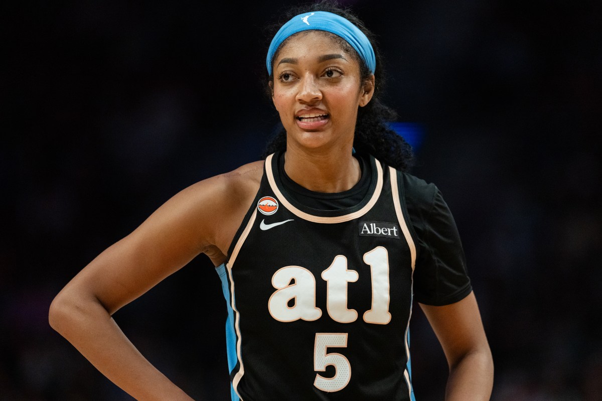 WNBA star Angel Reese reacts during the Atlanta Dream game against the Portland Fire
