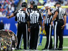 Árbitros da NFL recebem aumento “significativo” enquanto desastre de sarna é evitado Árbitros de futebol conferenciando em campo.
