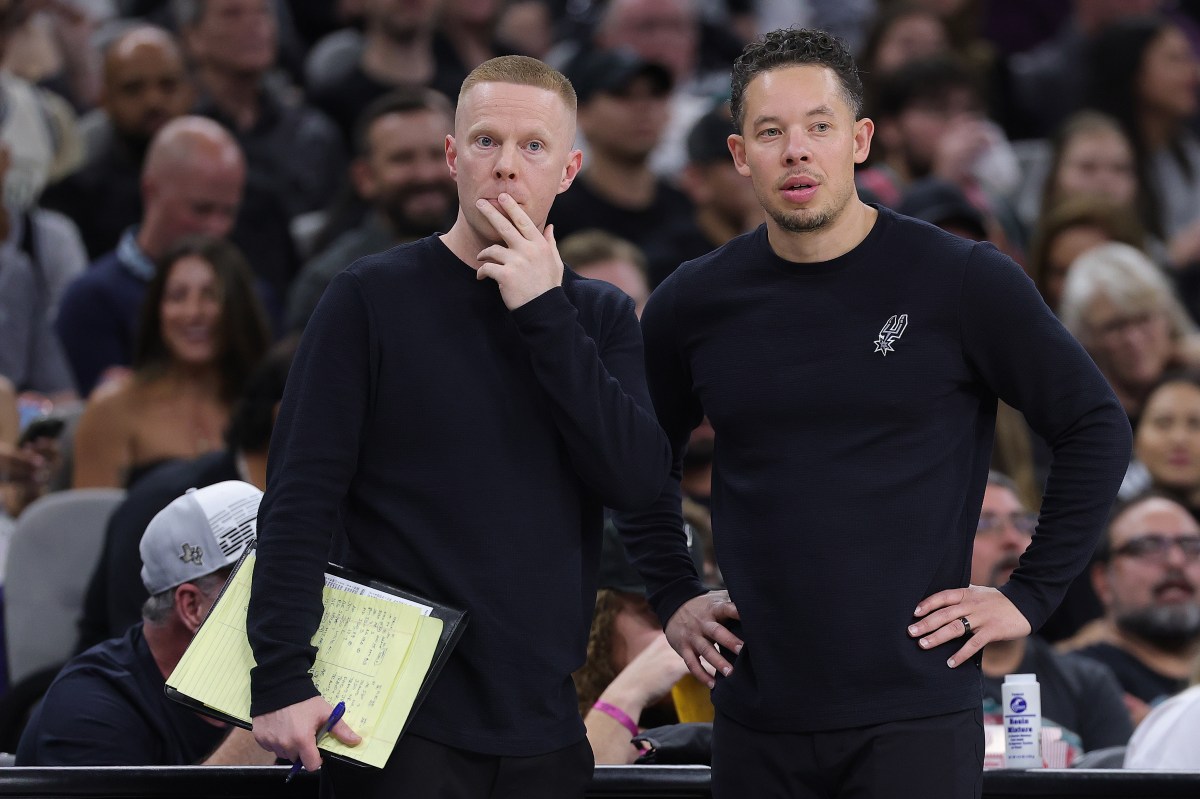 SAN ANTONIO, TEXAS - MAY 12: Associate head coach Sean Sweeney (L) and head coach Mitch Johnson of the San Antonio Spurs look on during the second quarter against the Minnesota Timberwolves in Game Five of the Second Round of the NBA Western Conference Playoffs at Frost Bank Center on May 12, 2026 in San Antonio, Texas. (Photo by Alex Slitz/Getty Images)