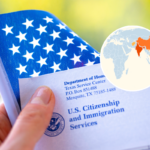 Main image: Washington, DC, USA - September, 16, 2019: Letter from USCIS and flag of USA in hand on green blurred background - stock image. Inset: Map showing most impacted nations
