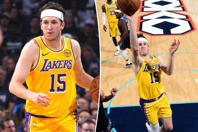 Austin Reaves, do Los Angeles Lakers, dribla a bola durante um jogo contra o Oklahoma City Thunder.