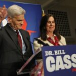 Senator Bill Cassidy (R-LA), with his wife Dr. Laura Cassidy by his side, addresses his supporters as he concedes his primary election contest during an event at Boudreaux's Caterers on May 16, 2026 in Baton Rouge, Louisiana. (Photo by Michael DeMocker/Getty Images)