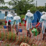 Medical staff work at an Ebola treatment center in Rwampara, Congo, on May 21. (AP Photo/Moses Sawasawa)