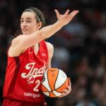 PORTLAND, OREGON - MAY 30: Caitlin Clark #22 of the Indiana Fever reacts after a foul was called during the first half of the game against the Portland Fire at Moda Center on May 30, 2026 in Portland, Oregon. (Photo by Ali Gradischer/Getty Images)
