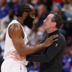 DETROIT, MICHIGAN - MAY 17: James Harden #1 and head coach Kenny Atkinson of the Cleveland Cavaliers speak during the second quarter against the Detroit Pistons in Game Seven of the Second Round of the NBA Eastern Conference Playoffs at Little Caesars Arena on May 17, 2026 in Detroit, Michigan. (Photo by Gregory Shamus/Getty Images)