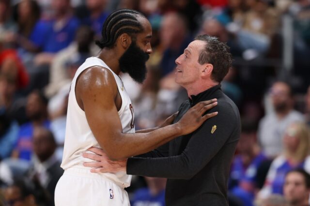 DETROIT, MICHIGAN - MAY 17: James Harden #1 and head coach Kenny Atkinson of the Cleveland Cavaliers speak during the second quarter against the Detroit Pistons in Game Seven of the Second Round of the NBA Eastern Conference Playoffs at Little Caesars Arena on May 17, 2026 in Detroit, Michigan. (Photo by Gregory Shamus/Getty Images)