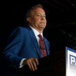 Texas Attorney General Ken Paxton speaks at an election night watch party held by the Lone Star Liberty PAC at the Dallas/Plano Marriott at Legacy Town Center on Tuesday in Plano, Texas.
