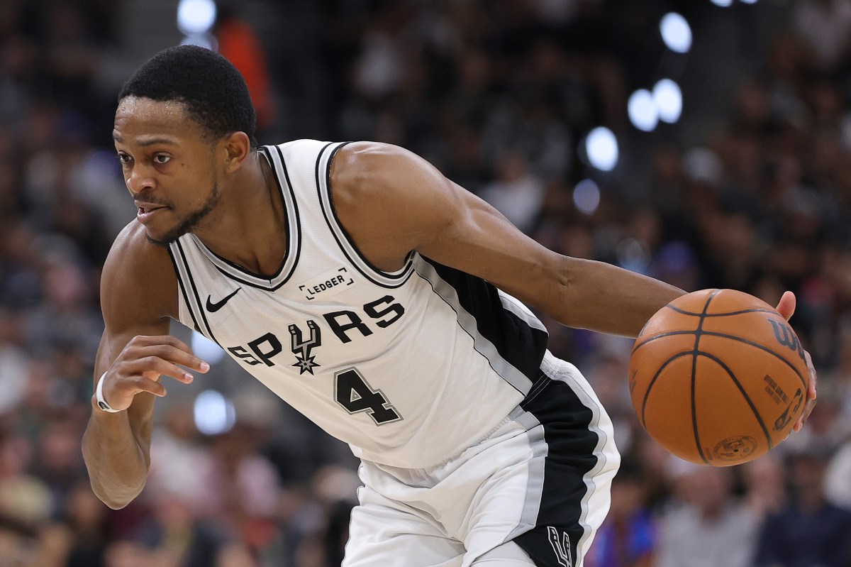 SAN ANTONIO, TEXAS - MAY 24:  De'aaron Fox #4 of the San Antonio Spurs handles the ball against the Oklahoma City Thunder during the third quarter in Game Four of the NBA Western Conference Finals at Frost Bank Center on May 24, 2026 in San Antonio, Texas. (Photo by Alex Slitz/Getty Images)