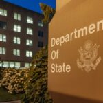 Office lights are illuminated in the U.S. Department of State headquarters on July 11, 2025, in Washington, DC.
