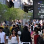 An electronic board displays the exchange rates of the U.S. dollar, the euro and the Brazilian real on the Florida pedestrian street in downtown Buenos Aires, Argentina, on February 6, 2026.