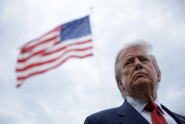 President Donald Trump speaks with members of the media prior to a Marine One departure from the South Lawn of the White House on May 8 in Washington, D.C.